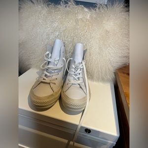 Converse White Leather Hightop Sneakers.